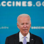 Biden Urges Nation Not To Panic Over Omicron Fears