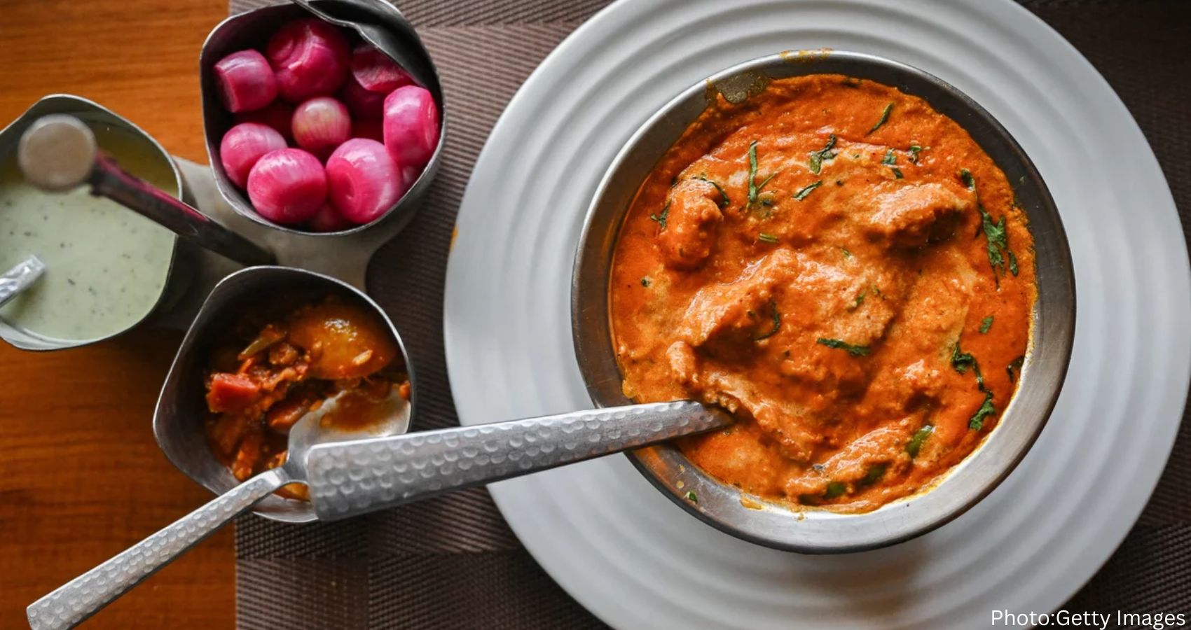 Feature and Cover Unraveling the Mystique of India's Beloved Butter Chicken A Culinary Tale of Origins and Controversy