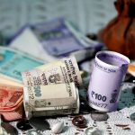 Featured & Cover Indian Rupee Expected to Erase Recent Gains and Approach Historic Low Analysts Say