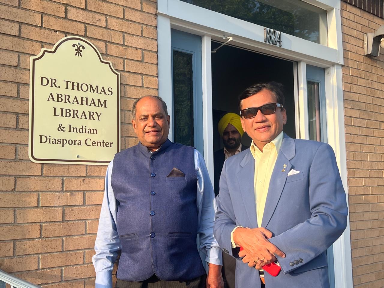 Dr Thomas Abraham and Dr Bhuvan Lall in front of the Indian Diaspora Center Dr Thomas Abraham and Dr Bhuvan Lall in front of the Indian Diaspora Center