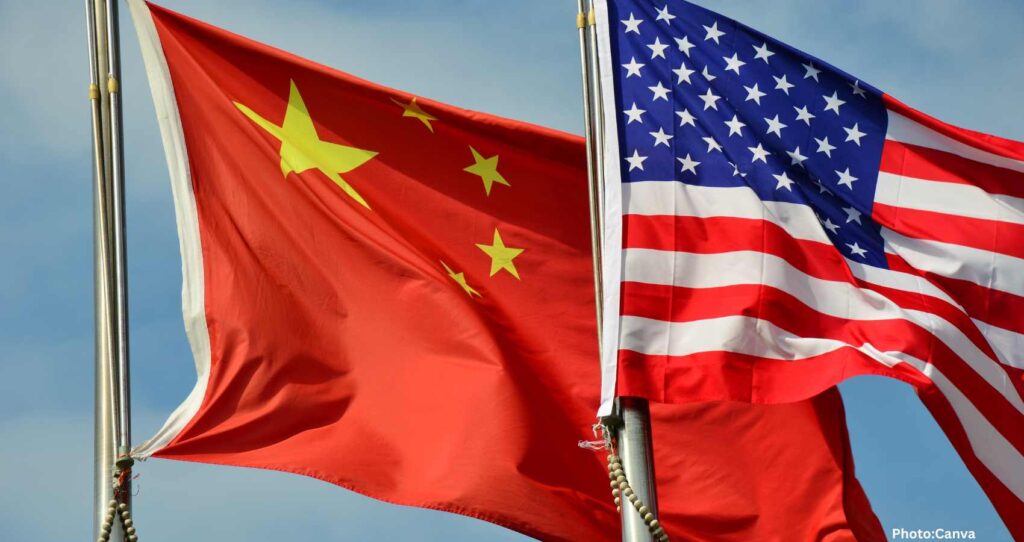 Feature and Cover Dow Jones Drops as China Issues Tariff Warning to US