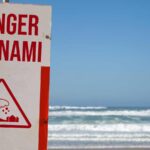 Feature and Cover Tsunami Threat Eases Evacuation Orders Lifted in Hawaii