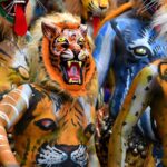 Feature and Cover Polish Woman Embraces Kerala's Pulikali Dance at Onam Festival
