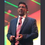 Feature and Cover Dinesh D'Souza Supports Trump Following Controversy Over H 1B Comments