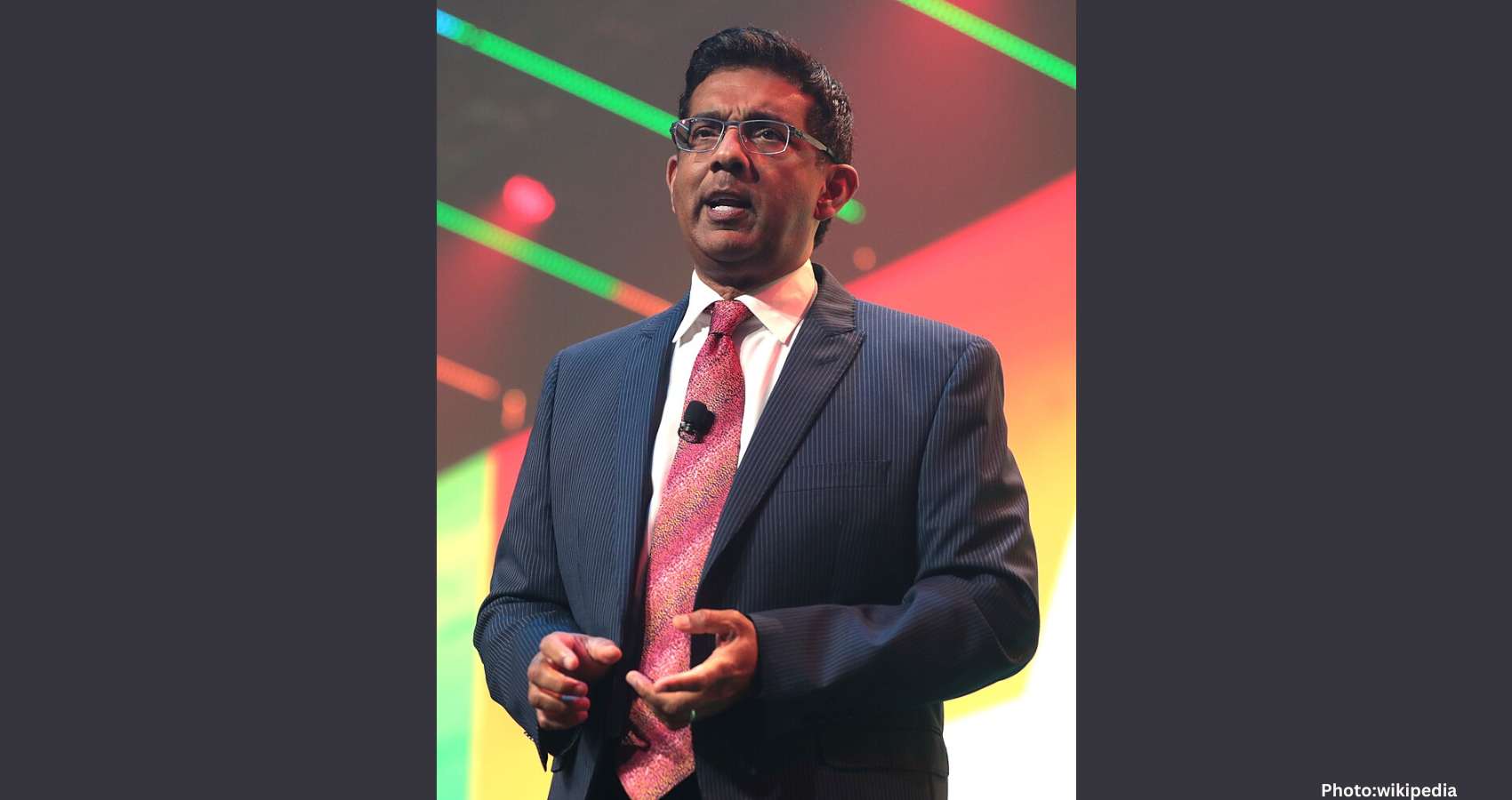 Feature and Cover Dinesh D'Souza Supports Trump Following Controversy Over H 1B Comments