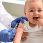 Feature and Cover Florida Proposes Ending Childhood Vaccination Mandates Amid Doctor Concerns