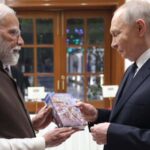 Feature and Cover DModi Presents Putin with Gifts Including Russian Gita Translation