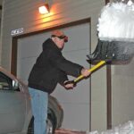 Feature and Cover Shoveling Snow Poses Health Risks for Older Adults Experts Warn