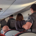 Featured & Cover Passengers Fight Midair Forcing Plane Diversion Reports Say