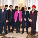 Featured & Cover Aruba's Xavier University Celebrates 18 Years Under Ravi Bhooplapur