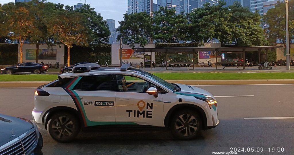 Robotaxi Departures from Airport with Passenger’s Suitcase