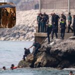 Featured & Cover Spain Deploys Military as Migrant Crisis Overwhelms Border Enclave