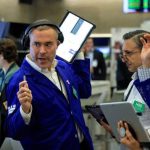 Featured & Cover Wall Street Stocks Decline as Federal Reserve Maintains Interest Rates