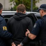 Featured & Cover FBI and Australian Police Arrest Two Suspects in Cybercrime Case